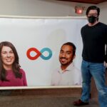 Me, standing in front of a Canadian Blood Services banner.